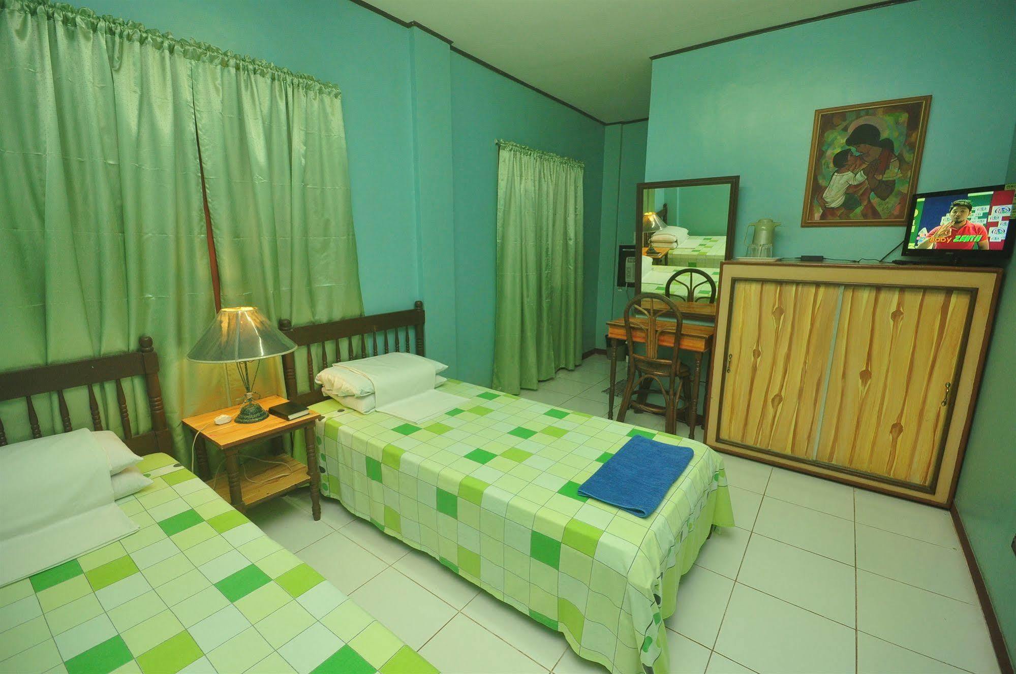 Lola Itang Pension House Tiniguiban Exteriör bild