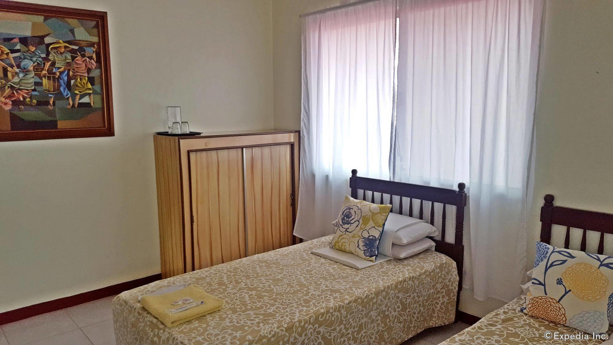 Lola Itang Pension House Tiniguiban Exteriör bild